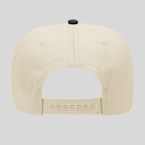 Beige cap with a black button on a light gray background