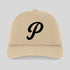 Beige cap with a black letter 'P' on a light gray background