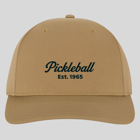 Beige cap with 'Pickleball Est. 1965' text on a light gray background