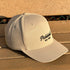 Beige cap with 'Pickled' logo on a wooden surface